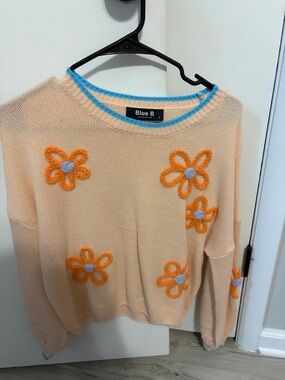 Collection B Cream Sweater with Orange Floral Appliqués and Blue Trim